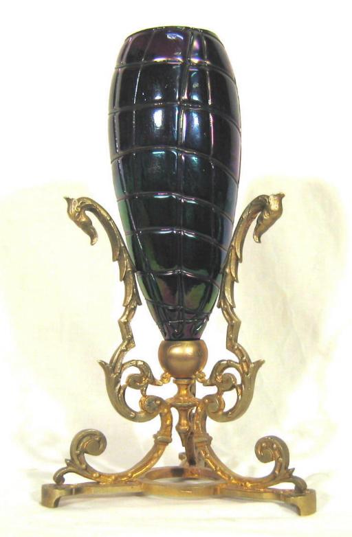 Pallme Koenig Vase in a bronze stand.