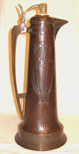 Jugendstil copper and brass wine jug.