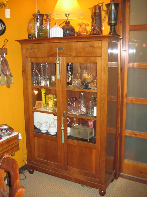 Walnut Glass Cabinet.