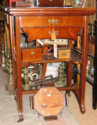 Art nouveau Walnut sewing table.