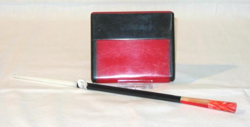 Art Deco Lady's Cigarette Case and Cigarette Holder.